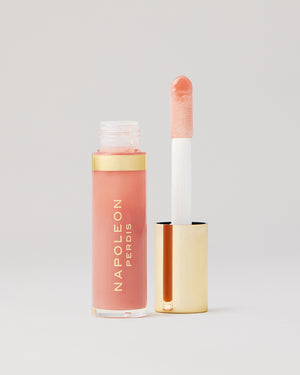 PHAT X JUICY PLUMPING LIP GLOSS IN THE NUDE open